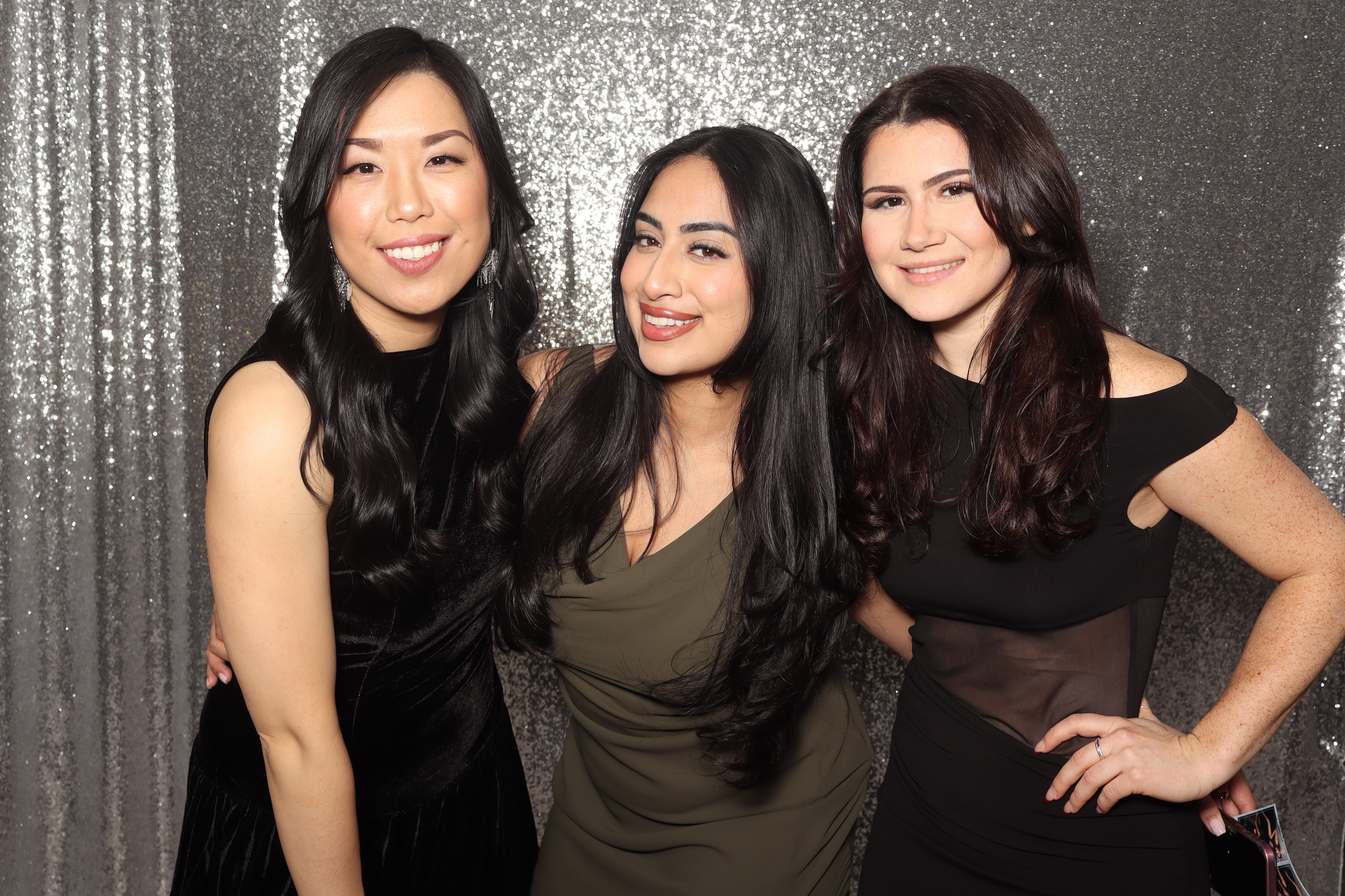 Guests using an open-air photo booth in the GTA